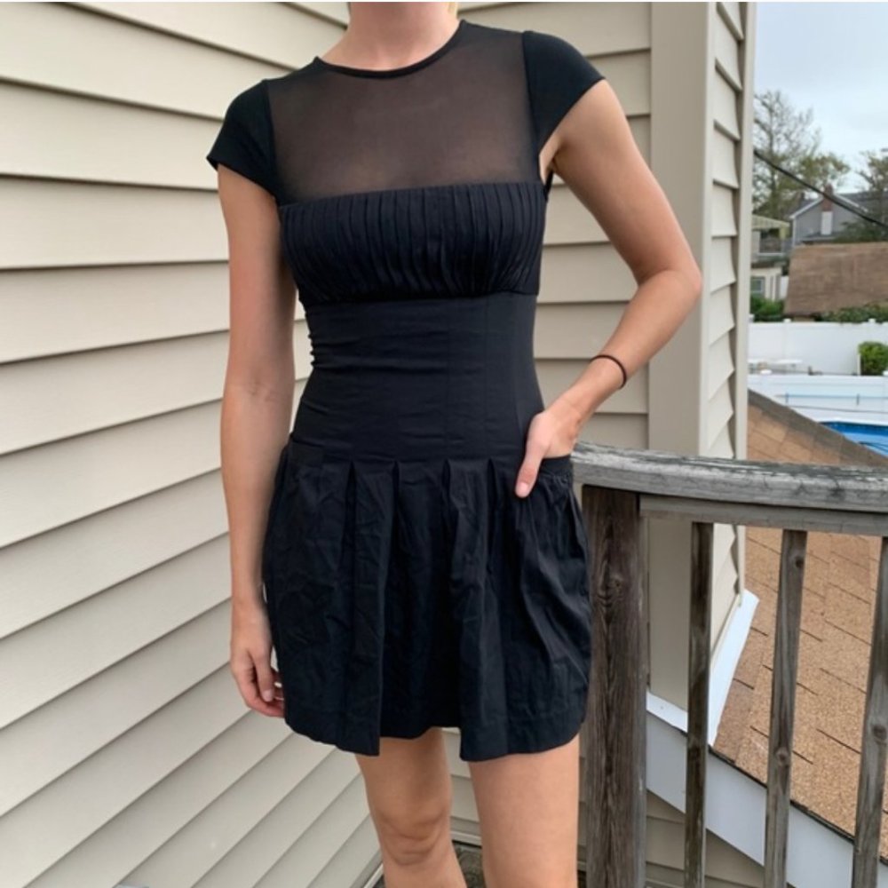 ALICE + OLIVIA black belted dress with sheer mesh top and pleated skirt